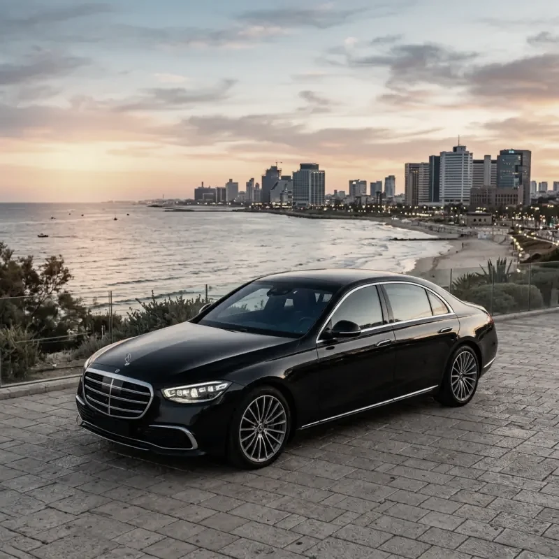 A black Mercedes-Benz S-Class sedan from the RT Tours fleet.